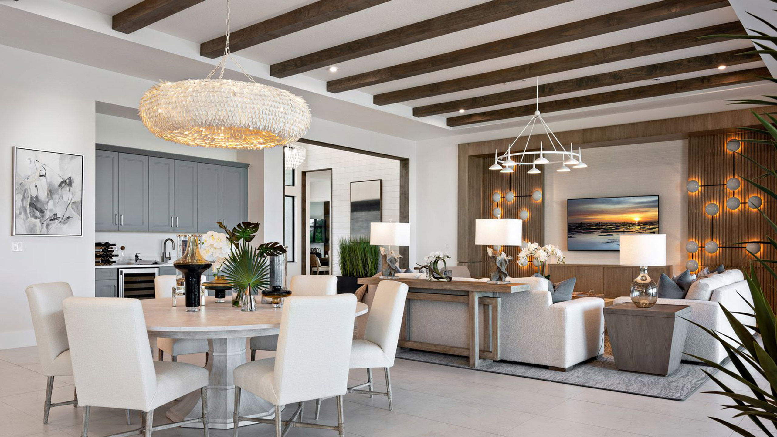 Open-concept great room and kitchen in an Astor Creek model home