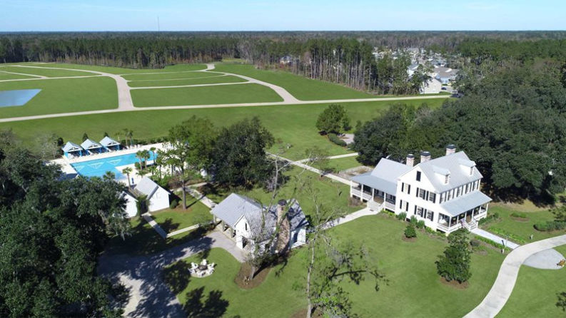 Amenities at The Ponds including clubhouse, pool, YMCA, and trails