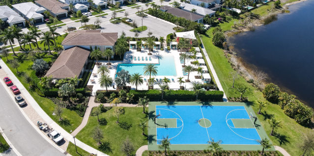 aerial of clubhouse with basketball court and pool