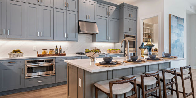 island kitchen with blue cabinets