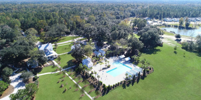 aerial photo of farmhouse and pool