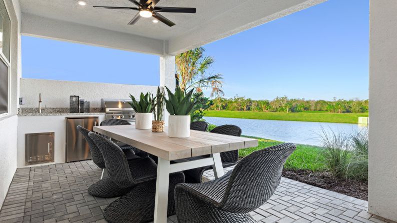 Custom outdoor living and pool at Woodland Preserve