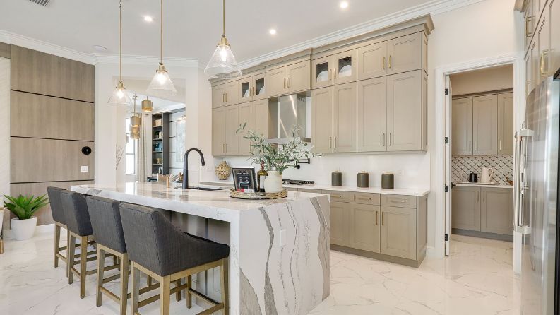 Designer kitchen in a Cove at Park Trace model home in Stuart Florida