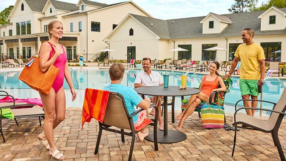 Relax in the Sun with Good Company by the Club Cresswind Pool. 