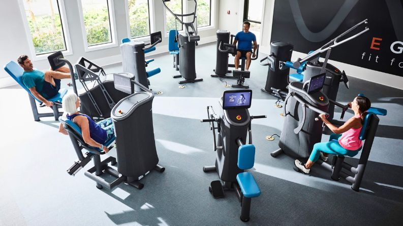 Residents training on EGYM Smart Strength equipment at a Kolter Homes community fitness center